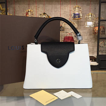 Fancybags LOUIS VUITTON CAPUCINES white