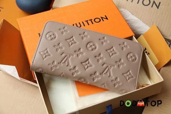 Louis Vuitton LV Zip Wallet Beige Size 19.5 x 10.5 x 2.5 cm - 1
