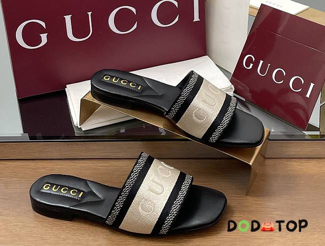 gucci Women's slide sandal with Black and white cotton canvas - 1