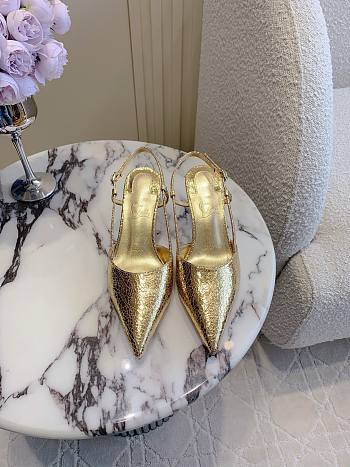 Christian Louboutin gold heels 01