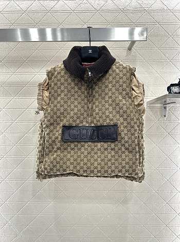 Gucci canvas sleeveless jacket with leather label