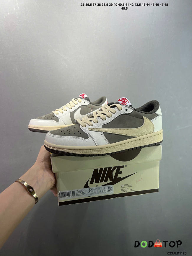 Travis Scott x Air Jordan 1 ” Reverse Mocha “ sneaker  - 1