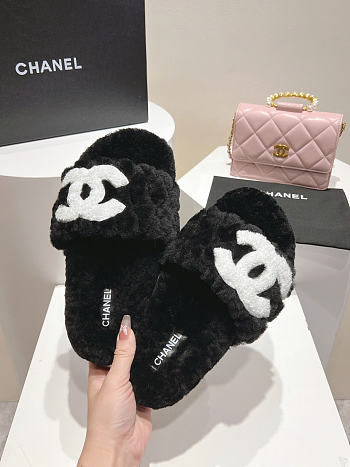 Chanel slippers black logo