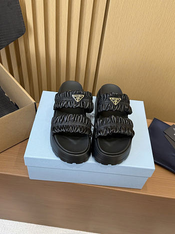 Prada Matelassé nappa leather flatform slides 